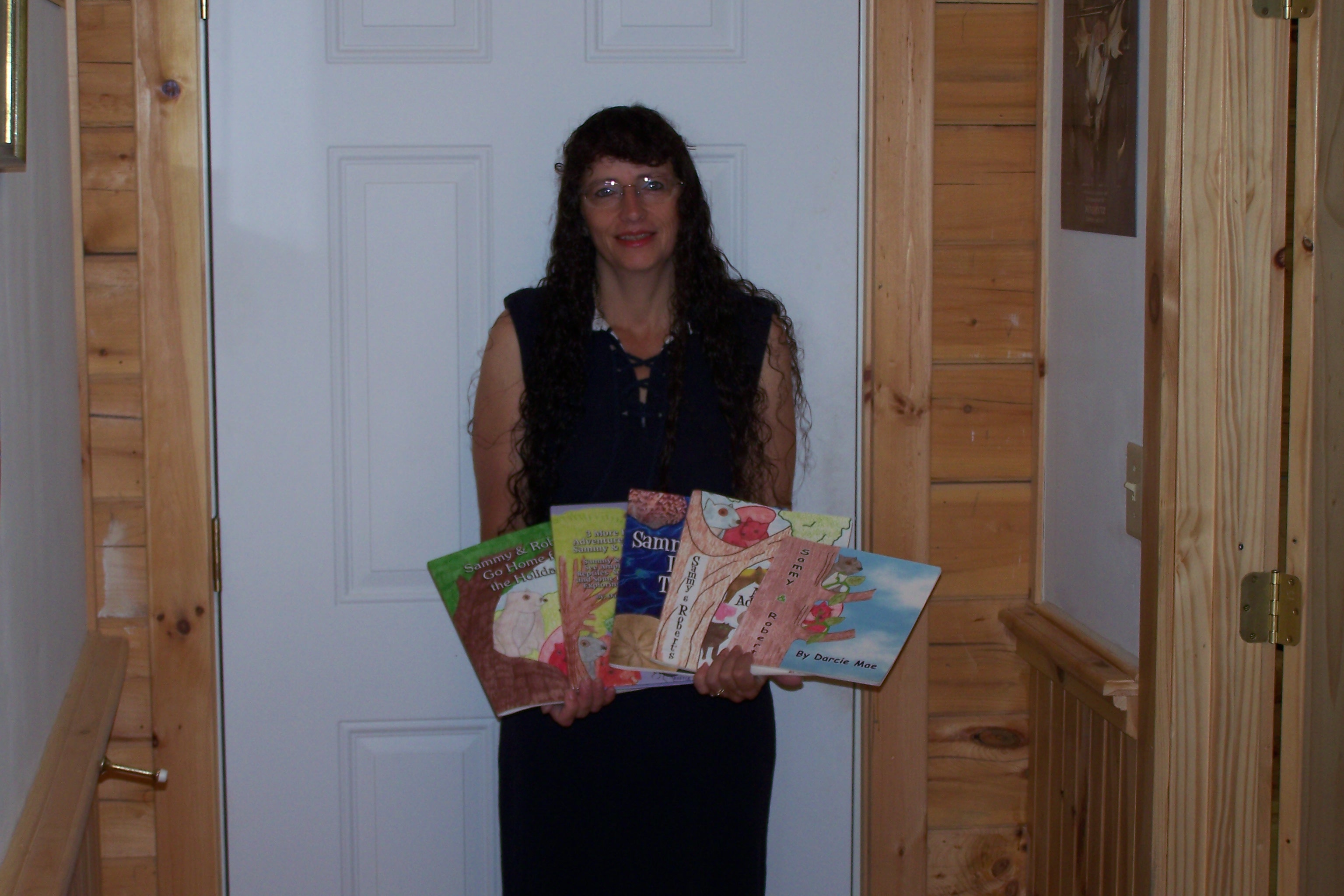 authorphotowithsammyandrobertbooks.jpg